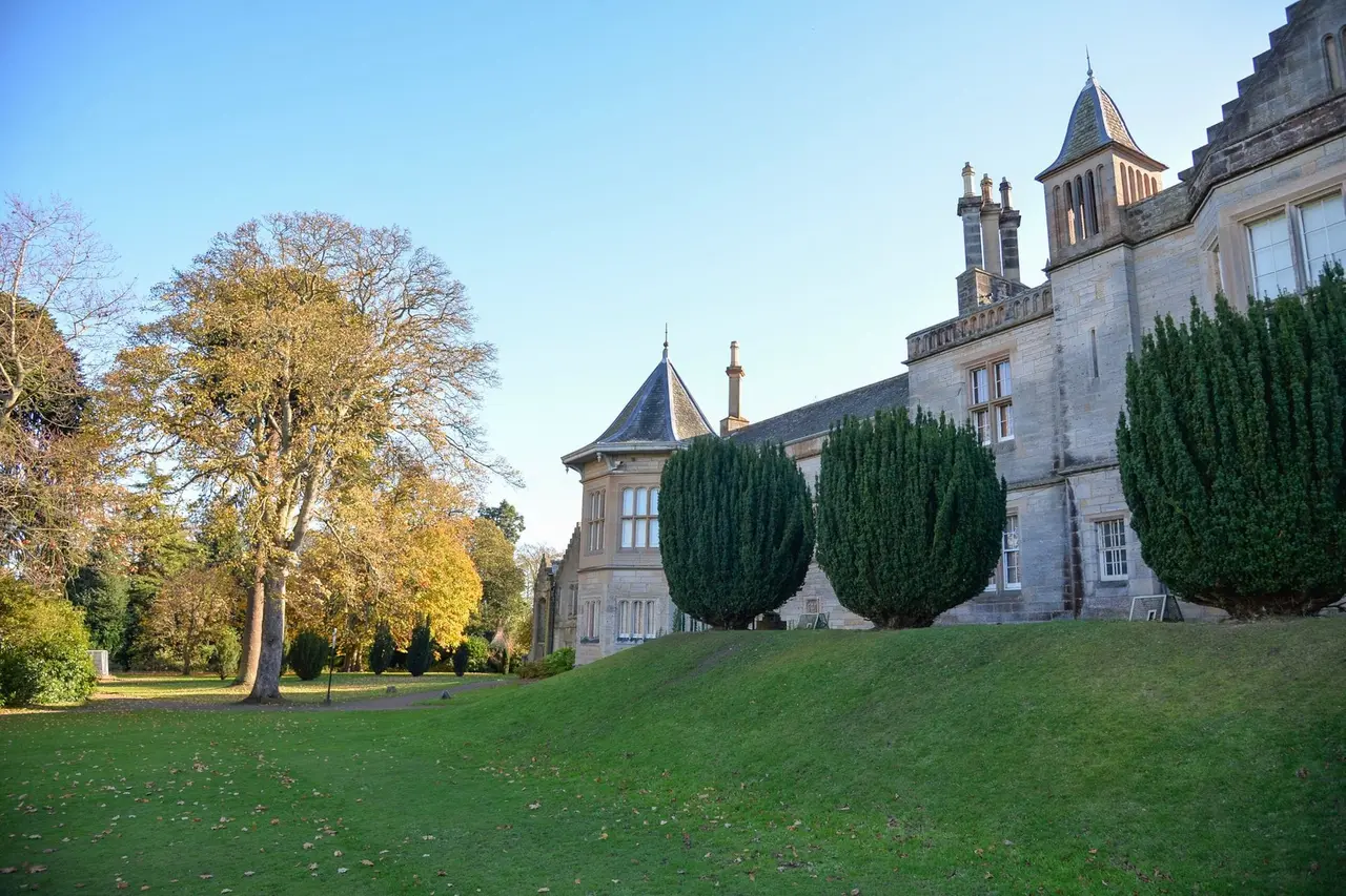 Lauriston Castle garden facade lined with clipped evergreen trees
