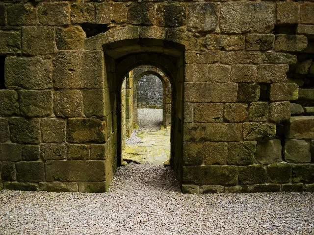 Aligned stone doorways inside Hermitage Castle